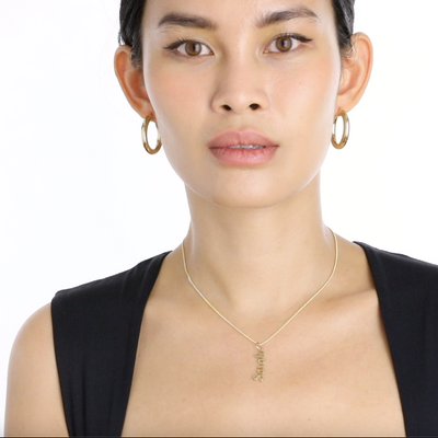 Helen Ficalora Script Name Charm On Necklace On Model