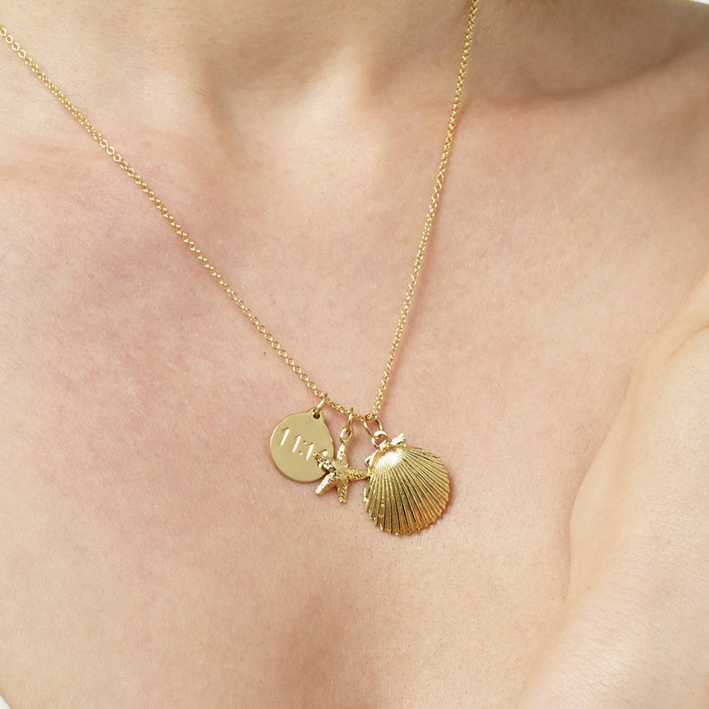 Starfish Charm Jewelry  on Model Helen Ficalora 14k Yellow Gold