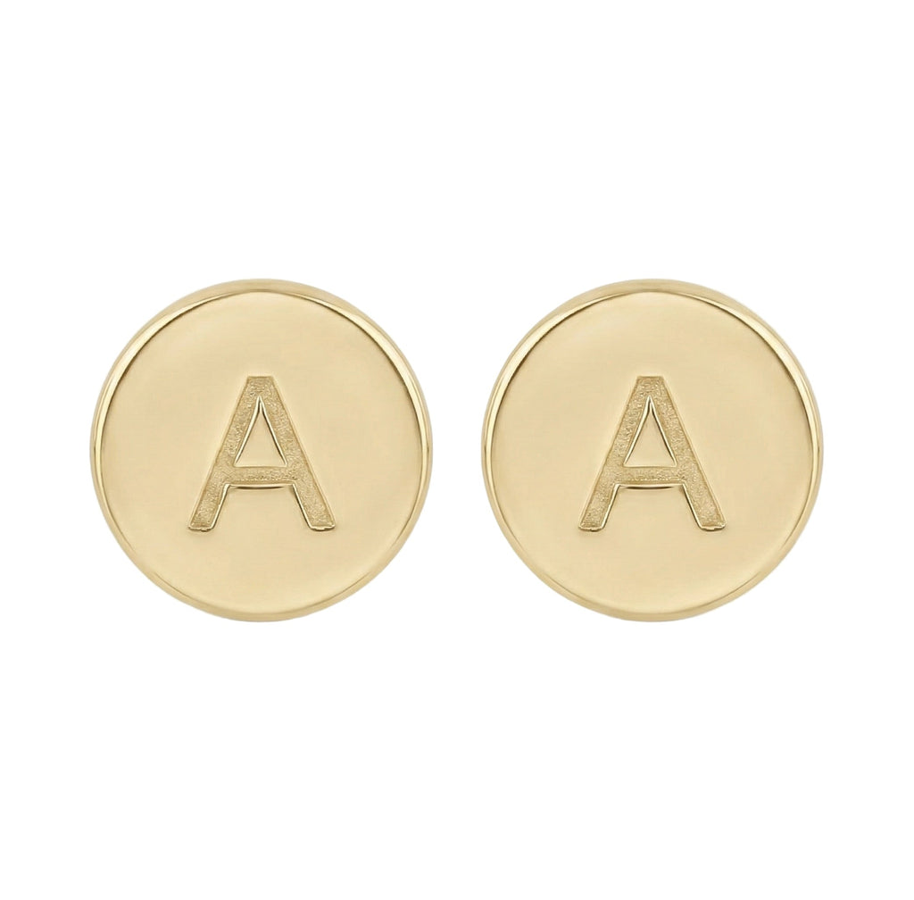 Gold earrings with 'A' initials on a white background