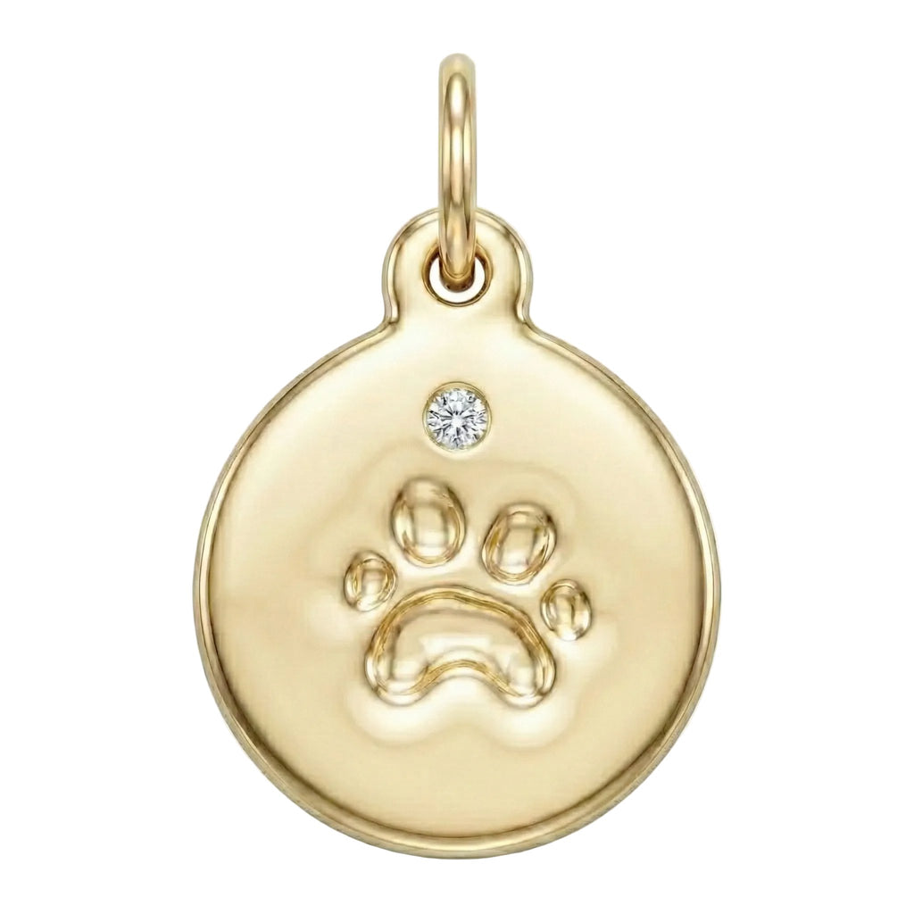 Gold pendant with paw print design and diamond on a white background