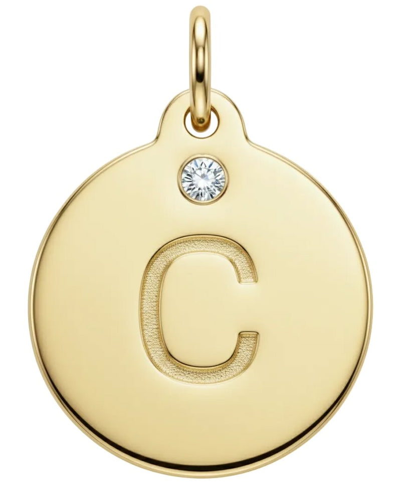 Gold pendant with letter 'C' and small diamond gemstone on a white background