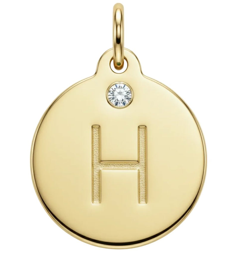 Gold pendant with letter 'H' and Diamond gemstone on a white background