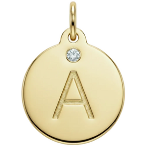 Gold pendant with letter 'A' and gemstone on a white background