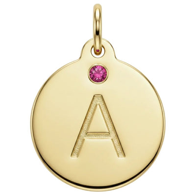 Gold pendant with letter 'A' and pink gemstone on a white background
