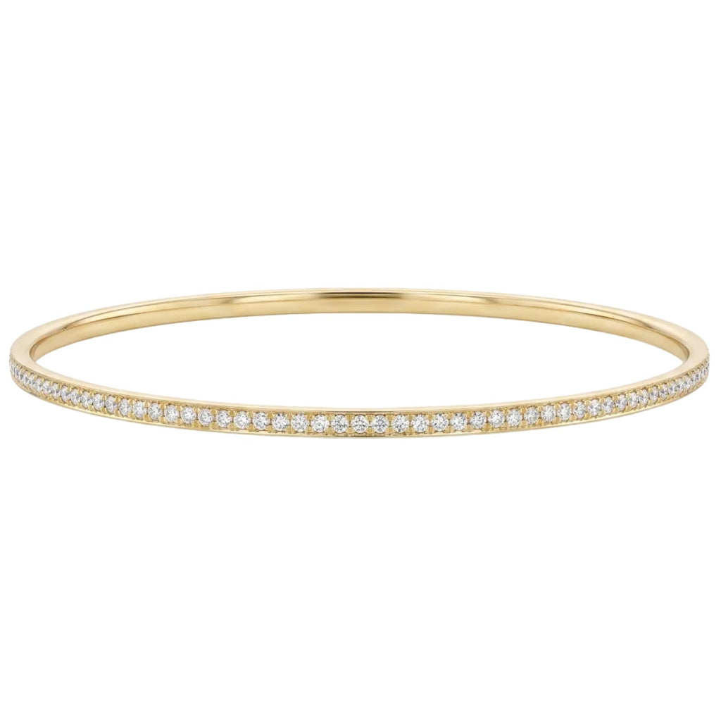 18k solid gold bracelet with small diamonds on a white background