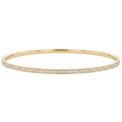18k solid gold bracelet with small diamonds on a white background