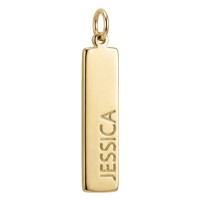 Gold pendant with 'JESSICA' engraved on a white background