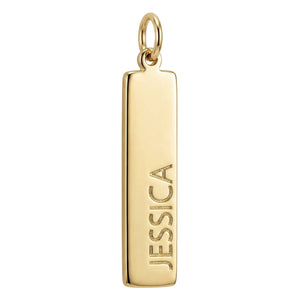 Gold pendant with 'JESSICA' engraved on a white background