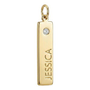 Gold pendant with 'JESSICA' engraved and a diamond on a white background