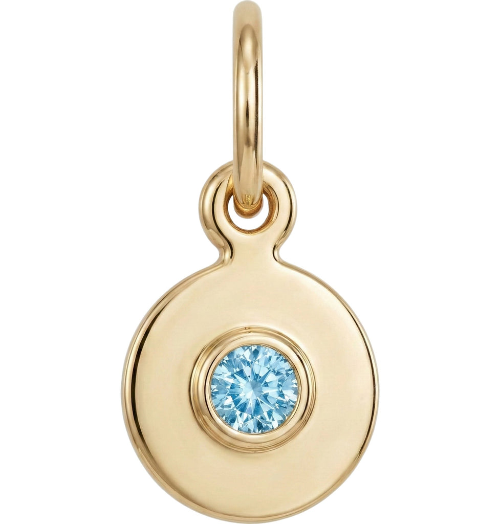 Gold pendant with a aquamarine gemstone on a white background