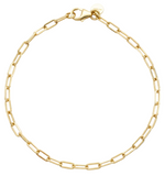 Gold chain bracelet on a white background