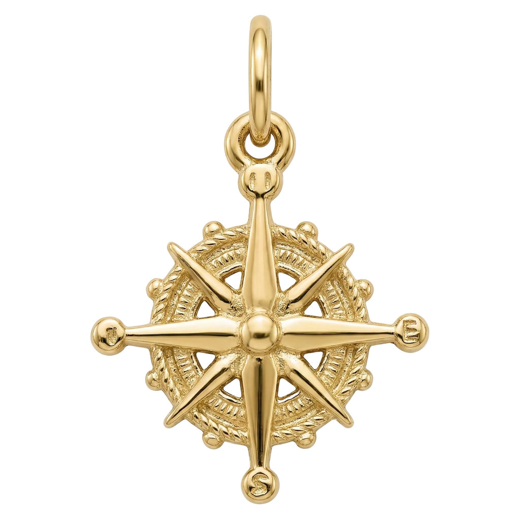 Gold compass pendant on a white background