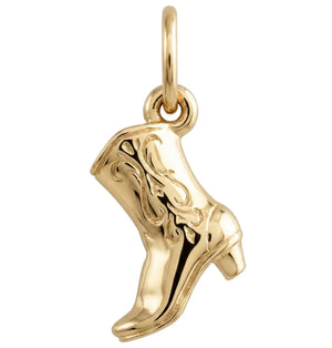 Gold cowboy boot charm on a white background