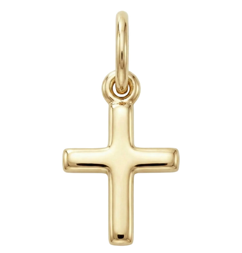 Gold cross pendant on a white background
