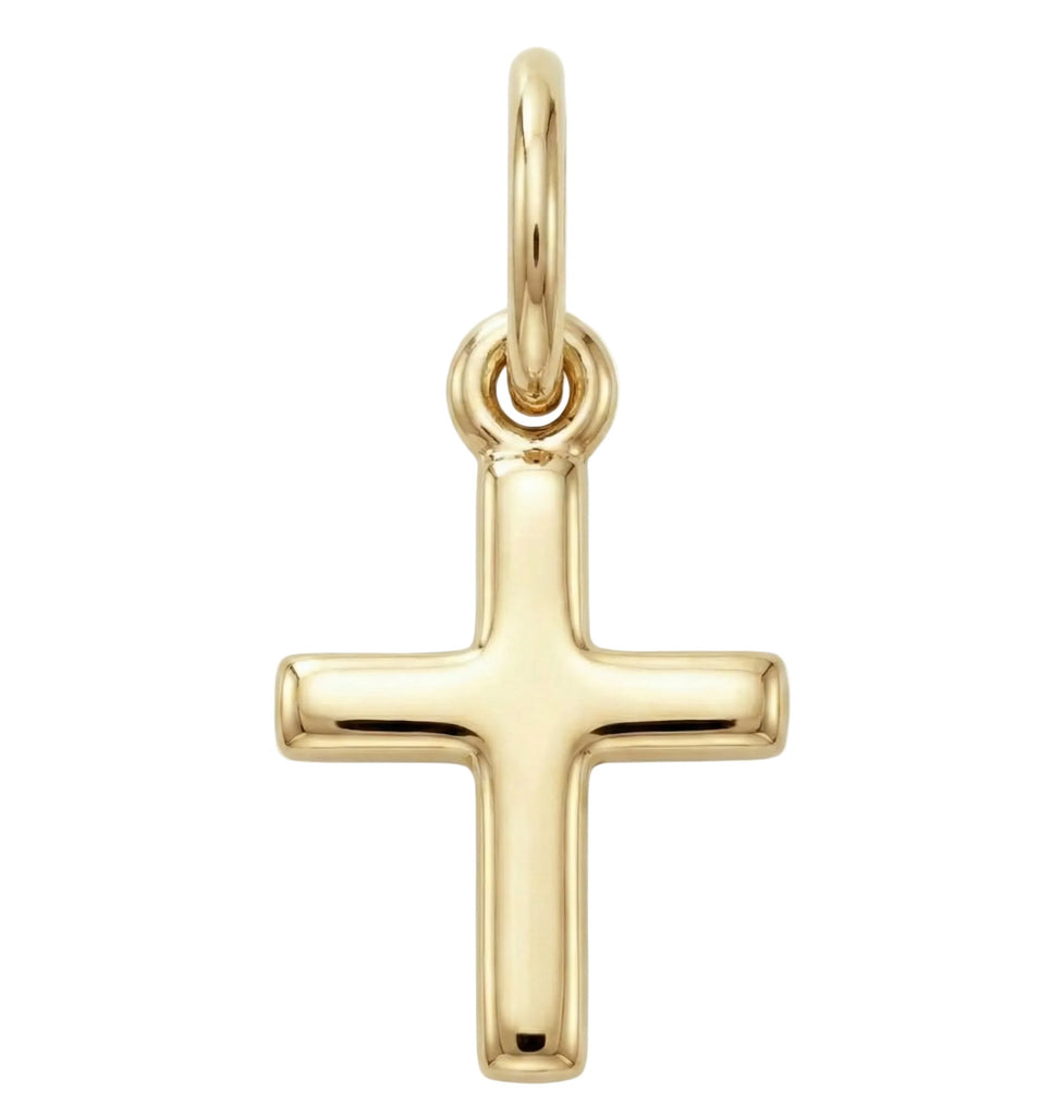 Gold cross pendant on a white background