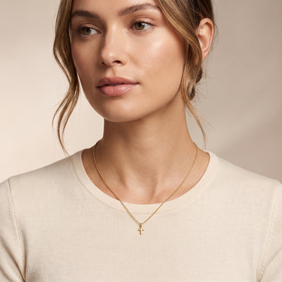 Cross Charm In 14k Yellow Gold On Models Necklace