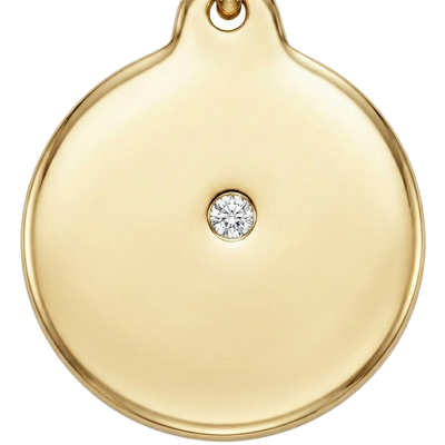 Gold pendant with a diamond on a white background