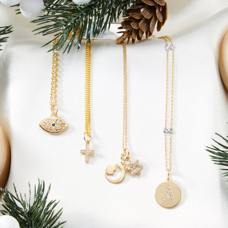 Tis the season! Shop our holiday jewelry this winter at Helen Ficalora. Necklaces, charms and chains with gold and diamonds.