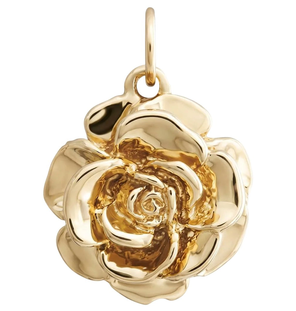 Gold rose-shaped pendant on a white background