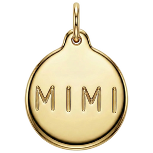 Gold pendant with 'MIMI' engraved on a white background
