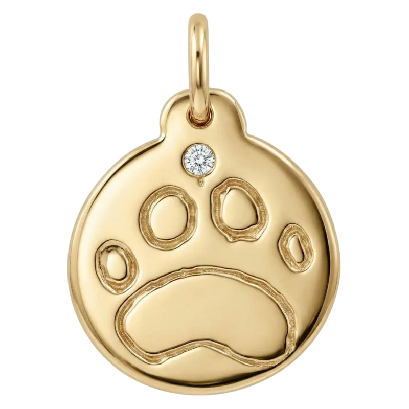 Gold paw print pendant with a diamond on a white background