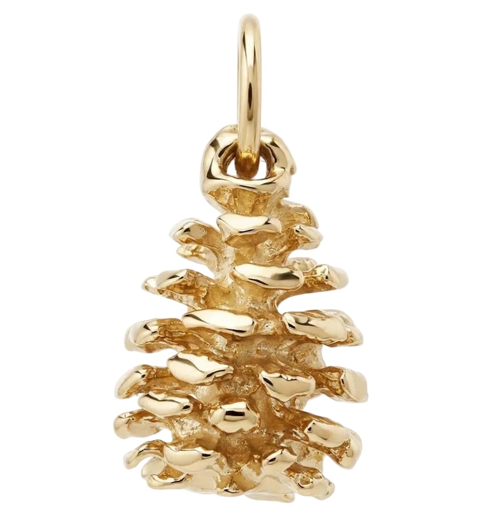 Gold pine cone charm on a white background