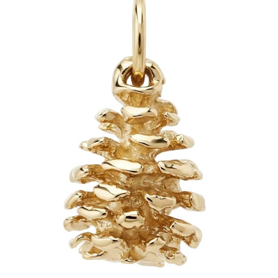 Gold pine cone charm on a white background