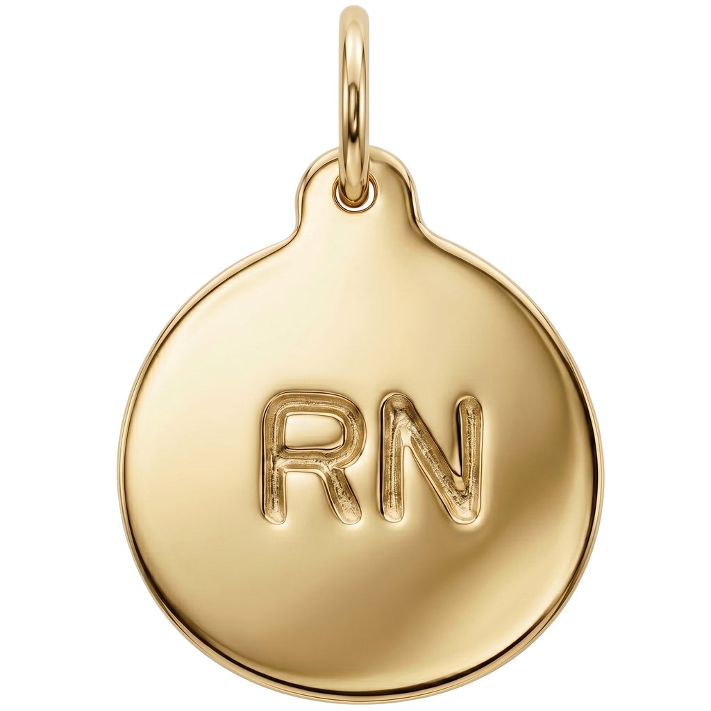 Gold pendant with 'RN' engraving on a white background