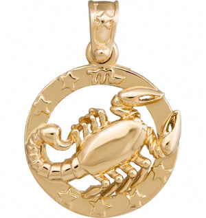 A polished gold pendant featuring a raised scorpion figure set against a circular background with engraved stars and the zodiac symbol, shown on a plain white background.