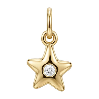 Gold star-shaped pendant with a diamond on a white background