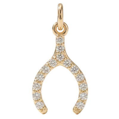 Gold and diamond wishbone pendant on a white background