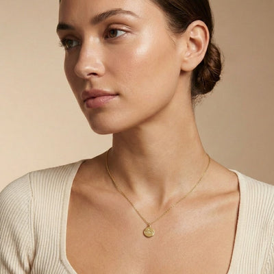 14k gold mimi charm with diamond on model