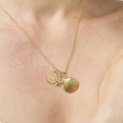 Starfish Charm Jewelry  on Model Helen Ficalora 14k Yellow Gold