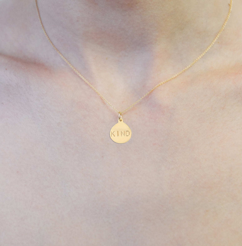 Helen Ficalora's Kind Disk Charm lovingly crafted in New York. Made With Solid 14k Gold. Gift Wrapped. Free Express Shipping. Custom Engraving.